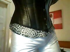 Tranny in white pvc is waiting in hotel room