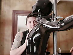 LatexGirl tied to pole apron cook vibrated