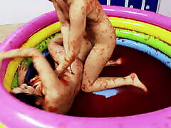 Two hotties in ll movies have playful wrestle in small pool