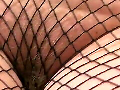 Hot Milf in Fishnet Pantyhose Shows Her Big Ass
