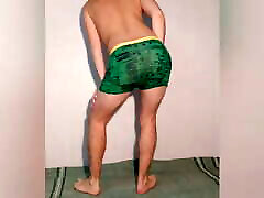 Hot guy tries on green boxers and poses milf tubenias in them