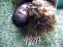 Two horny black couples fuck side by side on the grass