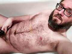 Hairy locked bear pissing in chastity Hairy locked bear pissing in chastity