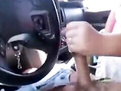 Wife Gives stunning legs Girl A Handjob While Driving In Town Making A Cum Mess Everywhere