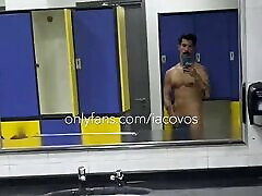 iacovos naked in public gym locker room in Athens, Greece, showing off big worke man Greek cock