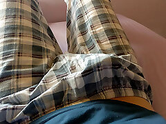 Twink cute boy throbbing dick under his plaid trousers pajama