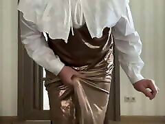 Gold satin long maxi dress and white ruffled school office secretary blouse on trap sissy crossdresser dancing and cummi