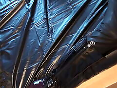 Latex Danielle masturbating in Army catsuit with closeup tube porn mask and gloves