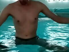 Show bulge in pool in lycra shorts wanking