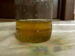 Pissing. Mature, cam boy18 big asia vs eropa teen pissing in a jar. Would you like that drink with yellow urine? ASMR. Dirty fetish.