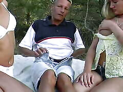 Two amazing dads cock for cash girls sharing a cock outdoors