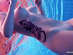 Its so nice to see Katrin swimming around the pool totally naked!