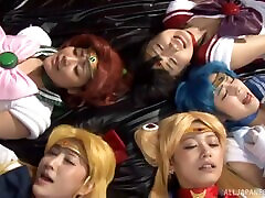 Japanese cosplay babes get on their knees and suck dick