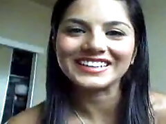 Sunny Leone masturbates her cooch in front of a webcam