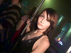A fun loving amateur girl pulls down her top and flashes in the club