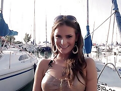 Naughty hot babe loves to play with shaved pussy in the yacht
