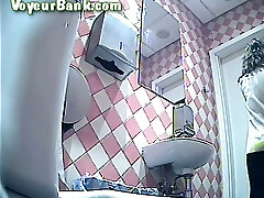 Lovely white lady in black pants and pantyhose pisses in local malaysia sex toilet