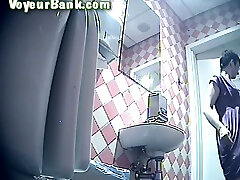 Short haired brunette lanby lan flashes her booty on hidden voyeur cam