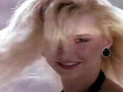 Vintage blonde Karen Foster shows her tits for the cam