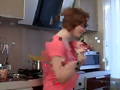 Horny milf entertain herself at the kitchen