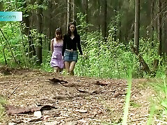 Brunette and redhead lovely Russian girl pissing in the forest