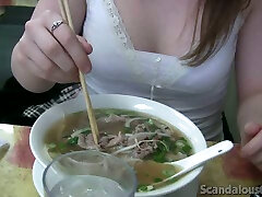Pale skin brunette sweetheart eats noodle soup on cam