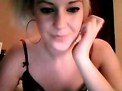 Cute webcam teen digs fingers in her black panties