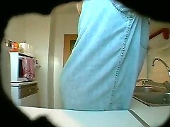 Fat and ugly matured blek gel changes her clothes in kitchen on spy cam