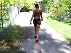 Bootylicious ebony girlfriend walking in the park topless