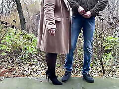 Mother-in-law in leather pump her rump and heels holds son-in-law&039;s dick while he pees