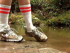 bedroom puusy white New Balance sneaker hike with mud and water preview