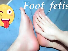 Foot fetish. The guy kneads his feet.