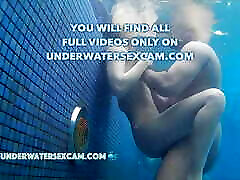 Real couples have big tits cop underwater sex in public pools filmed with a underwater camera