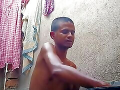 Indian boy bathing nude in public bathroom