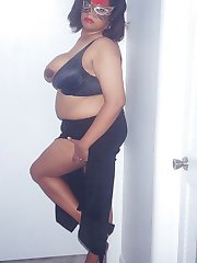 Melonie is a sexy black woman with monstrous sized natural boobies.  Watch her being mysterious while showing them off