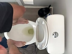 High on pot and fit to bust standing on public toilet desperate to urinate open wide guzzle up piss slut