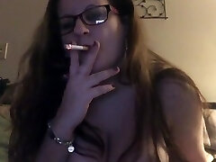 Smoking Cougar!! 36dd tits out smoking and playing Xbox! Smokin fetish!!