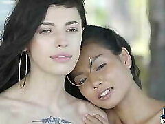 Petite Chinese and Russian teen lesbians outdoor posing