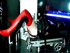 Gagged Rubber Slave Gets Plumbed