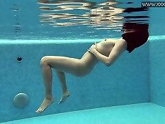 Torrid alone Lady Dee shows her tits and lovely bum underwater
