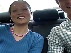 Wonderful brunette teen sucking a hard cock in the car