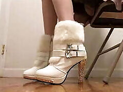 Chinese Girl shows off her sexy boot heels!