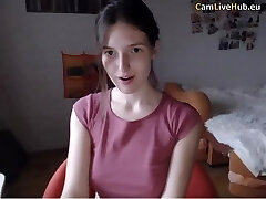 Horny brunette teen masturbating with a plaything