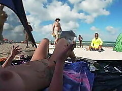 Exhibitionist Wife 511 - Mrs Kiss gives us her Nude BEACH POV view of a VOYEUR JERKING OFF in front of her and a few other folks watching!