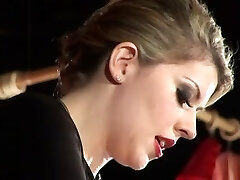 A caged slave gets strapon ass-fuck sex