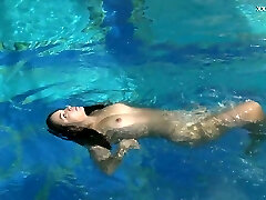 Beautiful mermaid Puzan Bruhova performs her hot underwater show
