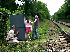 A guy jerks off while watching a duo fucking outdoors