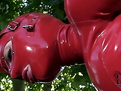 Latex Lucy in latex suit is fingering cunny