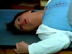 Professor in a handsome pleated skirt is fucked on a table