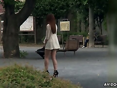 Lovely Japanese chick Ai Koda gives a fellatio in the car in wide daylight